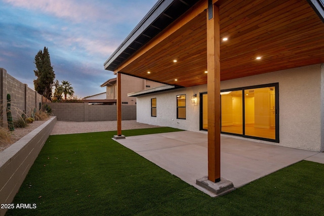 exterior space featuring a patio area and a fenced backyard