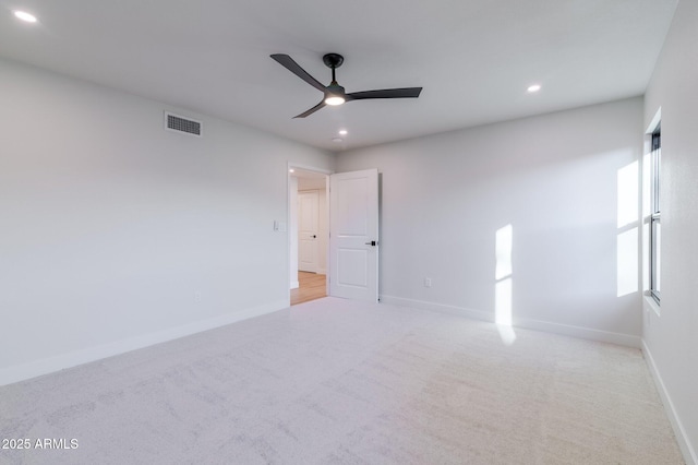 unfurnished room featuring visible vents, baseboards, ceiling fan, carpet floors, and recessed lighting