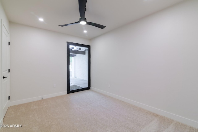 unfurnished room with a ceiling fan, recessed lighting, light colored carpet, and baseboards