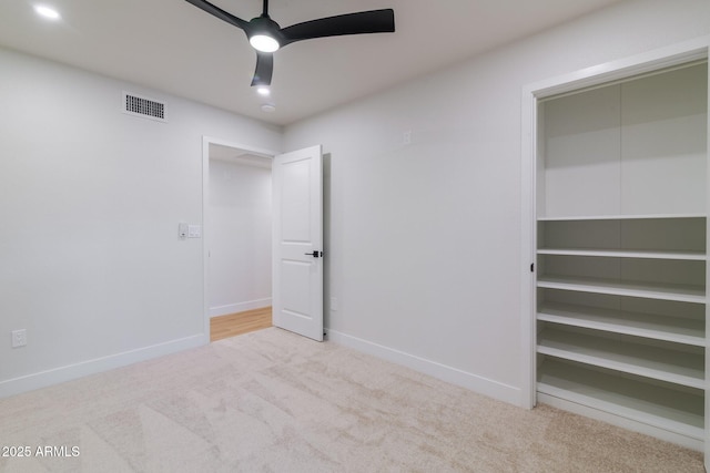 unfurnished bedroom featuring carpet floors, recessed lighting, visible vents, ceiling fan, and baseboards