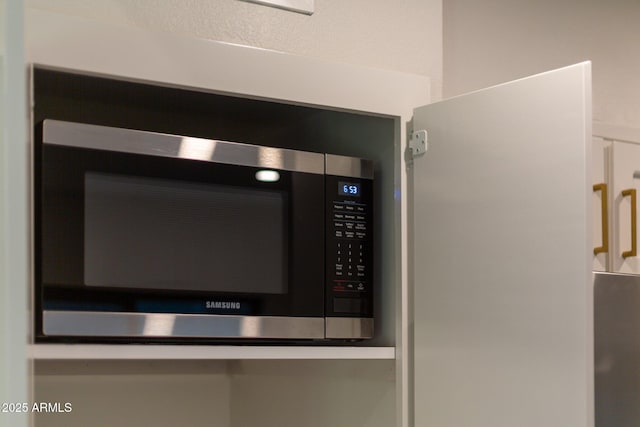 details featuring stainless steel microwave