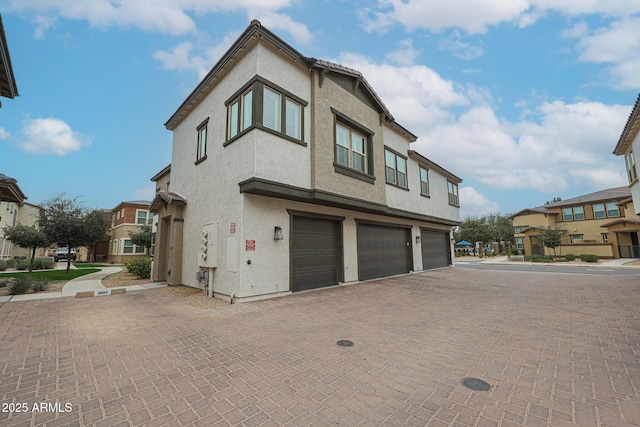 exterior space with a garage