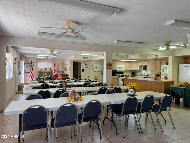 dining space with light tile patterned floors