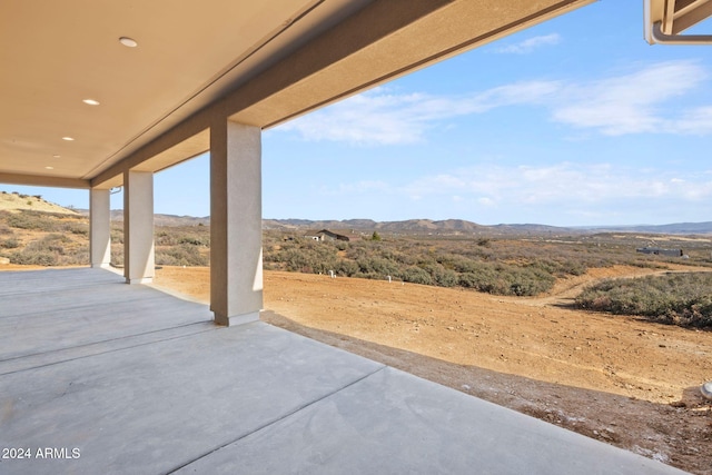 view of patio with a mountain view