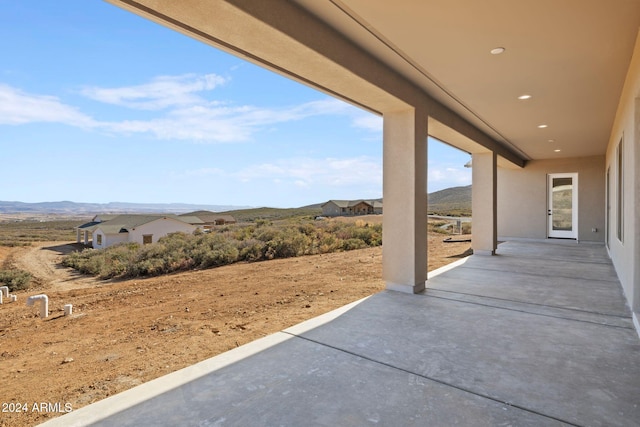 view of patio with a mountain view