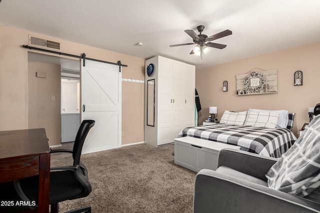 1263 W Del Rio St, Chandler, AZ 85224 - carpeted bedroom with a barn door, ceiling fan, and a closet
