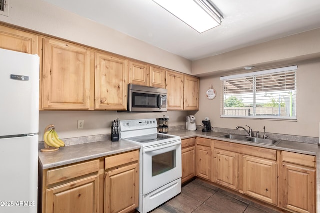 1263 W Del Rio St, Chandler, AZ 85224 - kitchen featuring white appliances, light brown cabinets, and dark tile patterned flooring