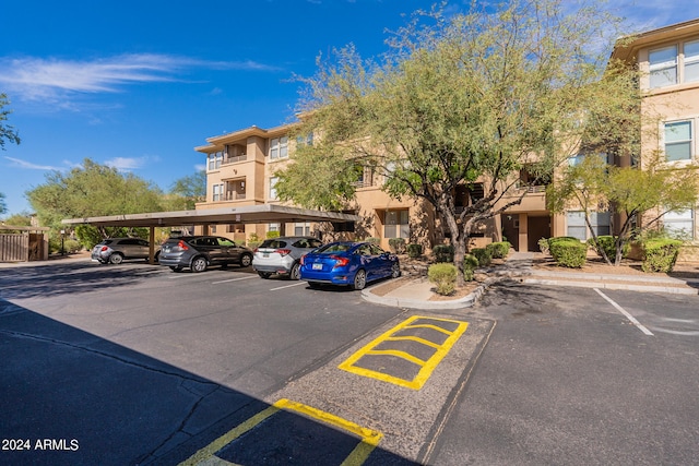 view of car parking with a carport