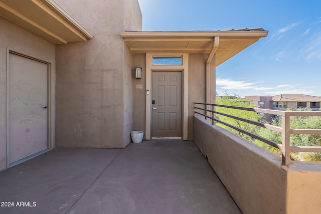 doorway to property with a balcony