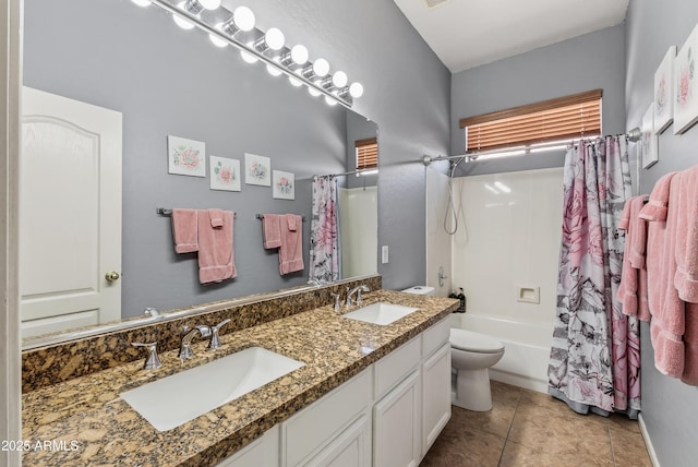 10897 S Turtle Dove Dr S, Goodyear, AZ 85338 - full bathroom with double vanity, shower / tub combo, and tile patterned flooring