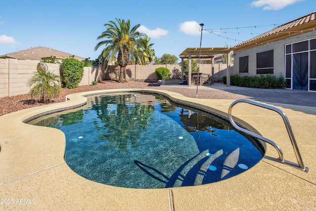 10897 S Turtle Dove Dr S, Goodyear, AZ 85338 - view of swimming pool featuring a fenced backyard and a patio