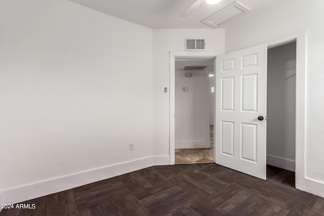 unfurnished bedroom featuring ceiling fan