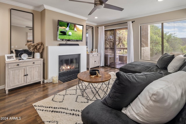 living room with ceiling fan, crown molding, and dark hardwood / wood-style flooring