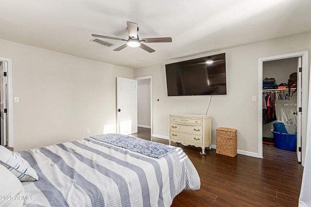 332 S 83rd Pl, Mesa, AZ 85208 - bedroom with a walk in closet, wood finished floors, a ceiling fan, and a closet