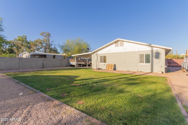 332 S 83rd Pl, Mesa, AZ 85208 - rear view of house with a fenced backyard and an attached carport