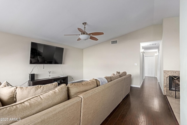 332 S 83rd Pl, Mesa, AZ 85208 - living room featuring ceiling fan, dark wood finished floors, lofted ceiling, and a fireplace