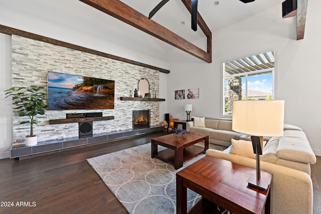 living room with a fireplace, dark hardwood / wood-style floors, ceiling fan, and high vaulted ceiling