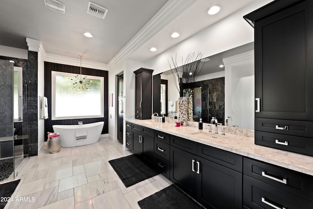 bathroom with crown molding, independent shower and bath, vanity, and an inviting chandelier