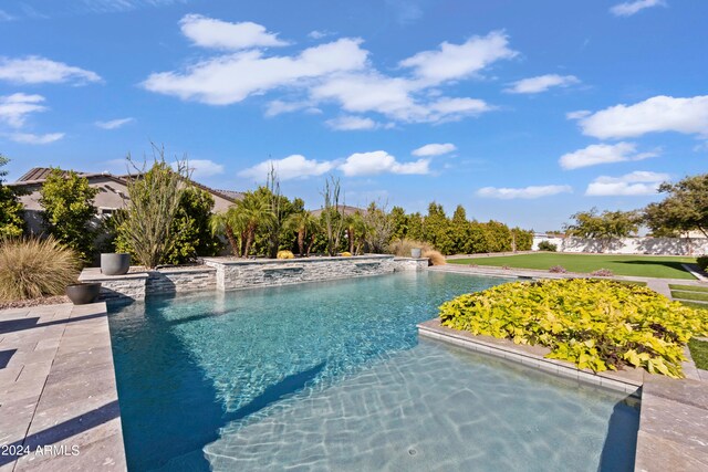 view of pool featuring pool water feature