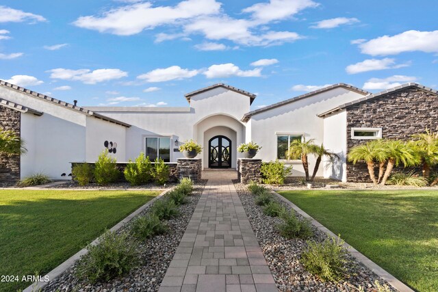 exterior space with a front lawn