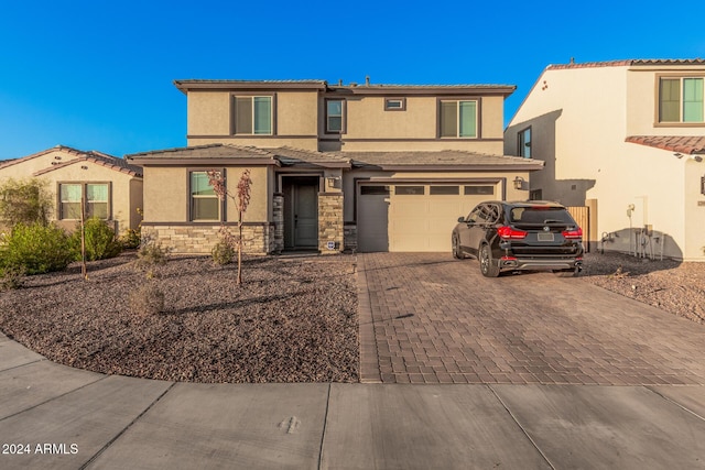 view of front of property featuring a garage