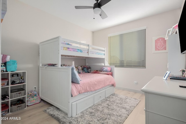 bedroom featuring ceiling fan and light wood-type flooring