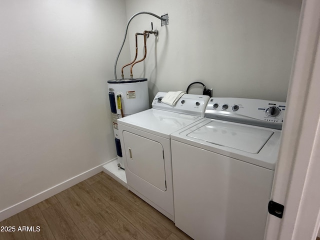 1421 W Pasadena Ave, Phoenix, AZ 85013 - laundry room with water heater, washing machine and dryer, and light wood-type flooring