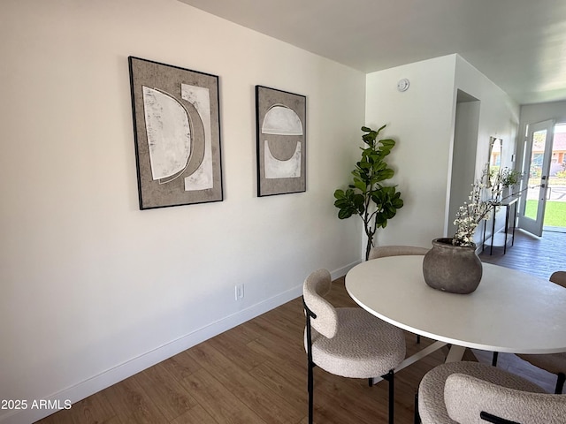 1421 W Pasadena Ave, Phoenix, AZ 85013 - dining room featuring wood finished floors and baseboards