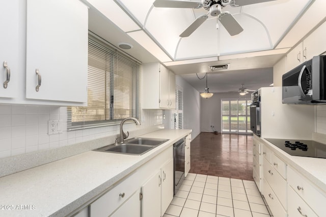 kitchen featuring light countertops, visible vents, appliances with stainless steel finishes, light tile patterned flooring, and a sink