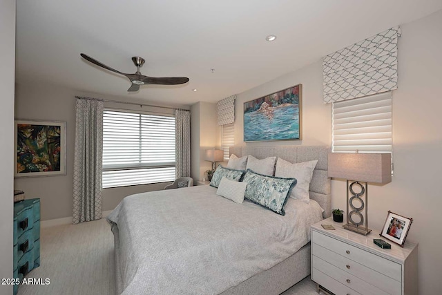 carpeted bedroom featuring recessed lighting, baseboards, and a ceiling fan