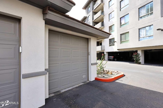 garage with driveway