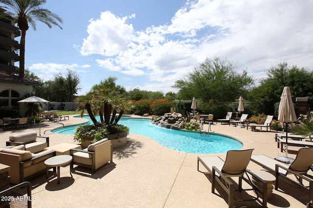 pool featuring a patio