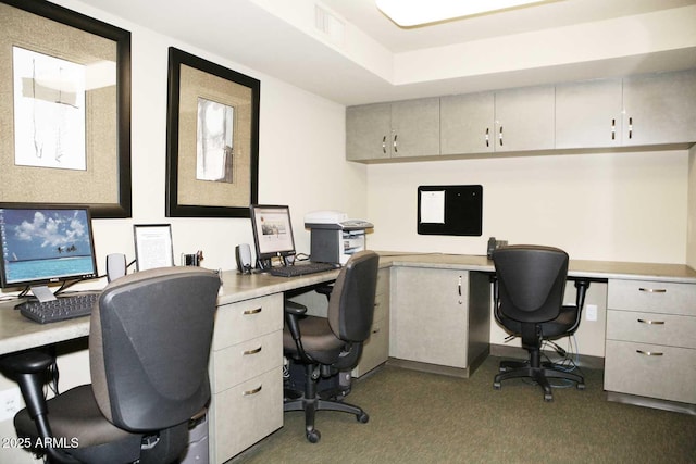 office with visible vents and built in study area