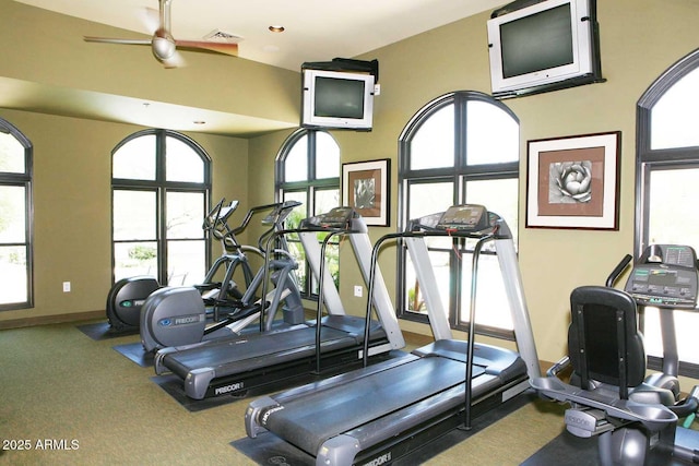 gym with baseboards and visible vents