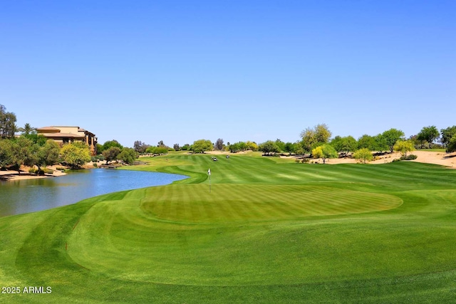 view of property's community with a water view and golf course view