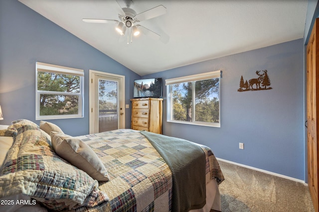 bedroom featuring vaulted ceiling, multiple windows, carpet, and baseboards