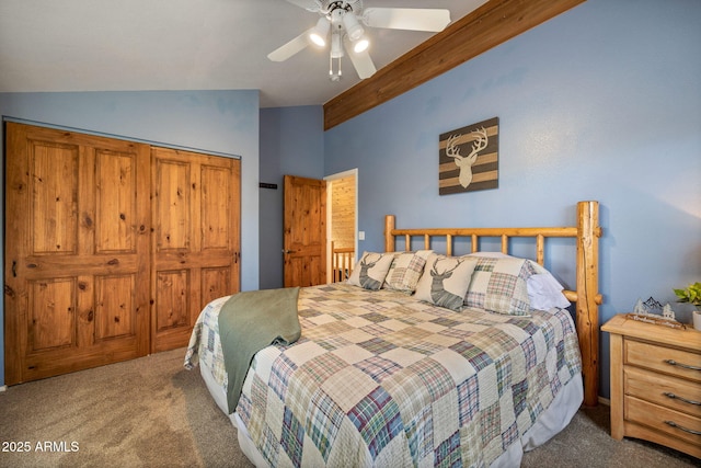 carpeted bedroom with vaulted ceiling with beams and a ceiling fan