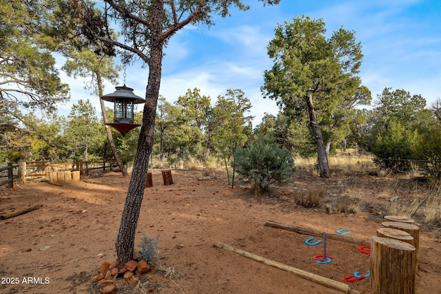 view of play area featuring fence