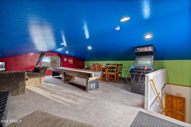 playroom featuring carpet flooring and vaulted ceiling