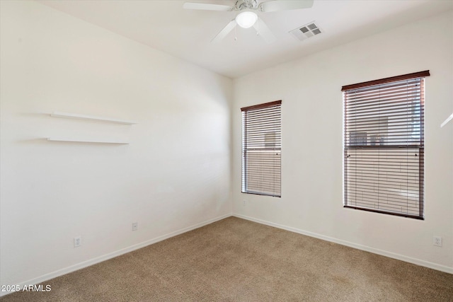 43998 W Palo Abeto Dr, Maricopa, AZ 85138 - unfurnished room featuring ceiling fan, light colored carpet, plenty of natural light, and visible vents