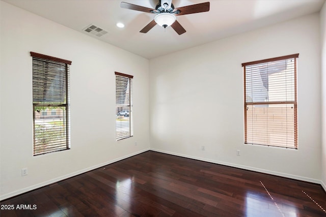 43998 W Palo Abeto Dr, Maricopa, AZ 85138 - spare room with a ceiling fan, baseboards, visible vents, and wood finished floors