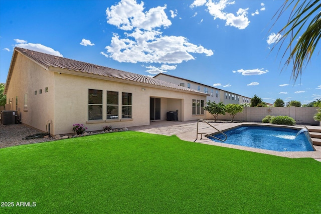 43998 W Palo Abeto Dr, Maricopa, AZ 85138 - view of swimming pool featuring cooling unit, a fenced backyard, a fenced in pool, a patio area, and a lawn