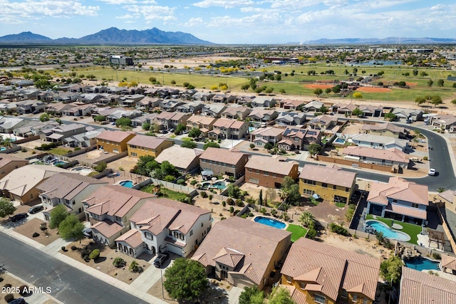 43998 W Palo Abeto Dr, Maricopa, AZ 85138 - drone / aerial view with a residential view and a mountain view