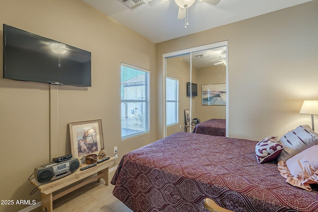 bedroom with a closet and ceiling fan