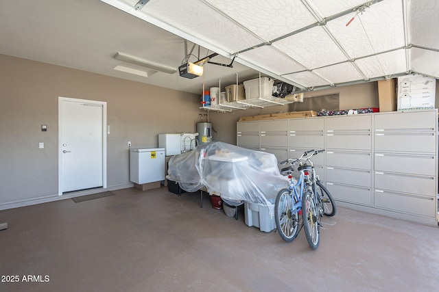 garage featuring a garage door opener and water heater