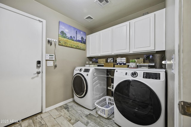 43650 W Snow Dr, Maricopa, AZ 85138 - laundry room featuring baseboards, cabinet space, visible vents, and washer and dryer