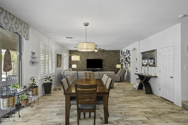 43650 W Snow Dr, Maricopa, AZ 85138 - dining space with light wood finished floors, visible vents, and ceiling fan