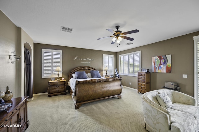 43650 W Snow Dr, Maricopa, AZ 85138 - bedroom with light carpet, baseboards, and visible vents