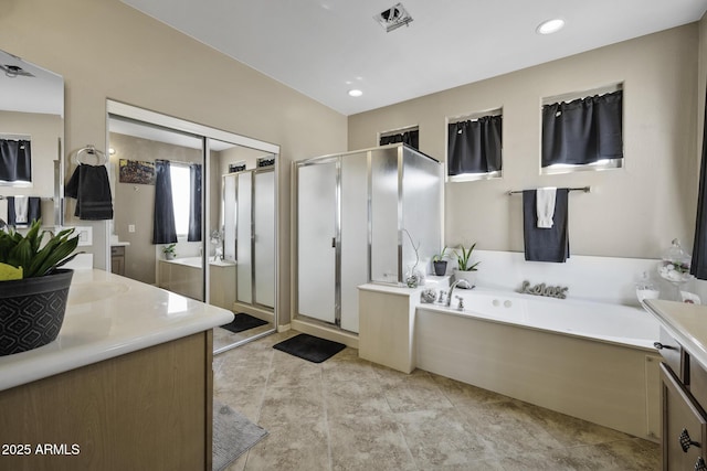 43650 W Snow Dr, Maricopa, AZ 85138 - bathroom with a stall shower, recessed lighting, vanity, and a garden tub