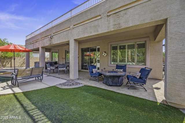 43650 W Snow Dr, Maricopa, AZ 85138 - view of patio featuring a fire pit and fence